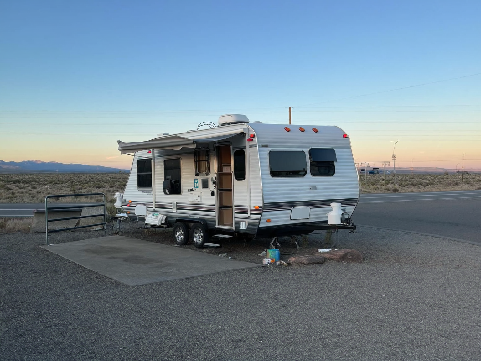 Travel trailer parked safely at a full hookup RV site in Casper after a Wyoming towing day