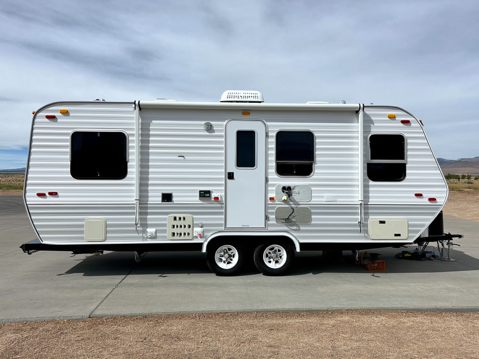 Long-stay RV setup with organized utility connections at a Casper RV park